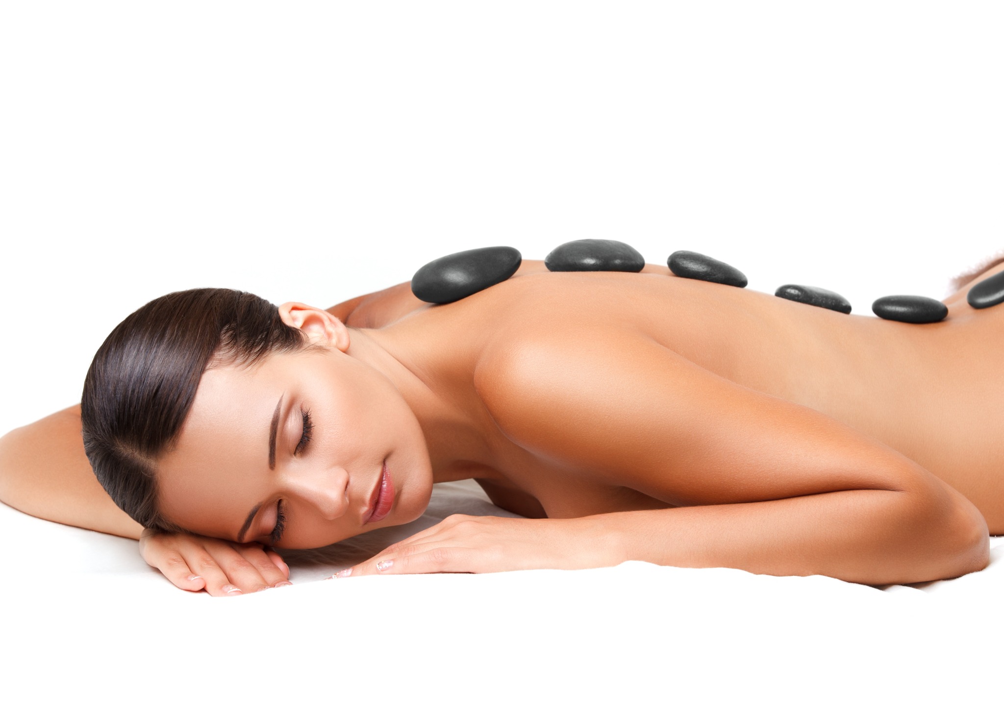 Warm massage stones used during an Aroma Stone full-body massage at Spa Lotus Darwin